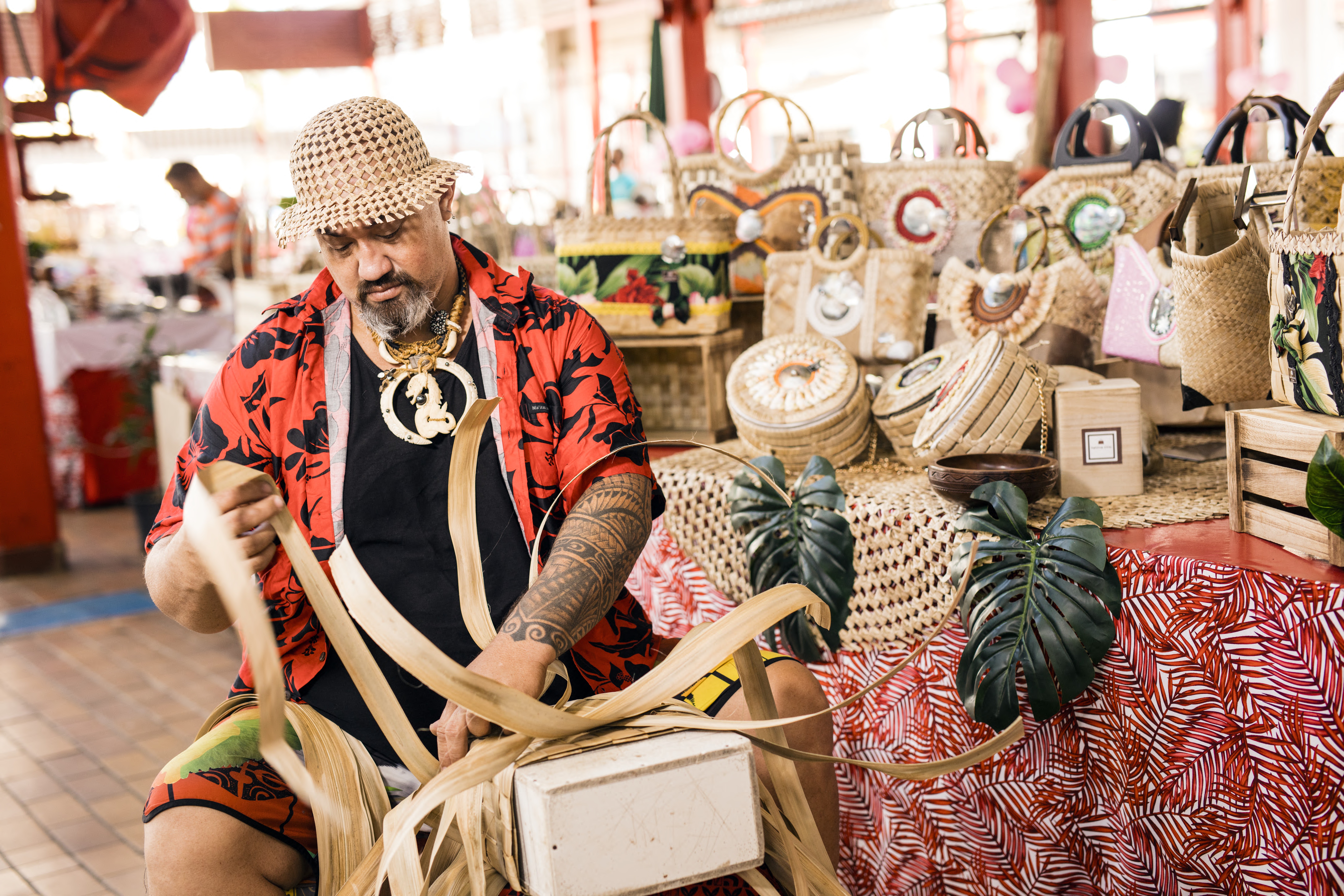 | Blue Tahiti Travel Local Artisan Showcasing Handmade Art at the Best Markets in Tahiti