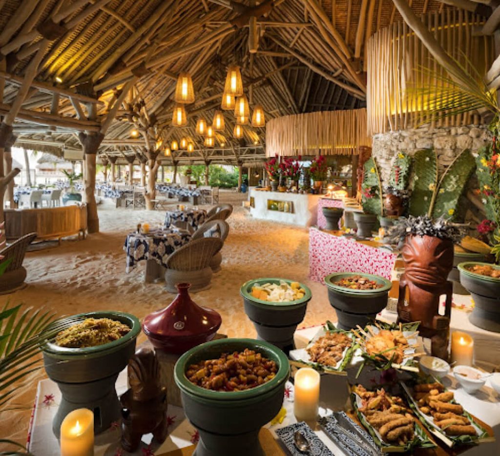 | Blue Tahiti Travel Delicious Buffet at Le Bora Bora by Pearl Resorts Featuring a Variety of Fresh Local and International Dishes in a Scenic Tropical Island Setting.