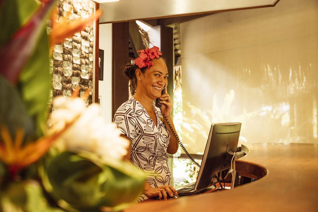 | Blue Tahiti Travel Warm Tahitian Welcome at Sofitel Kia Ora Moorea Beach Resort, Where Staff Greet Guests with Leis and Smiles, Showcasing the Island’s Renowned Hospitality.