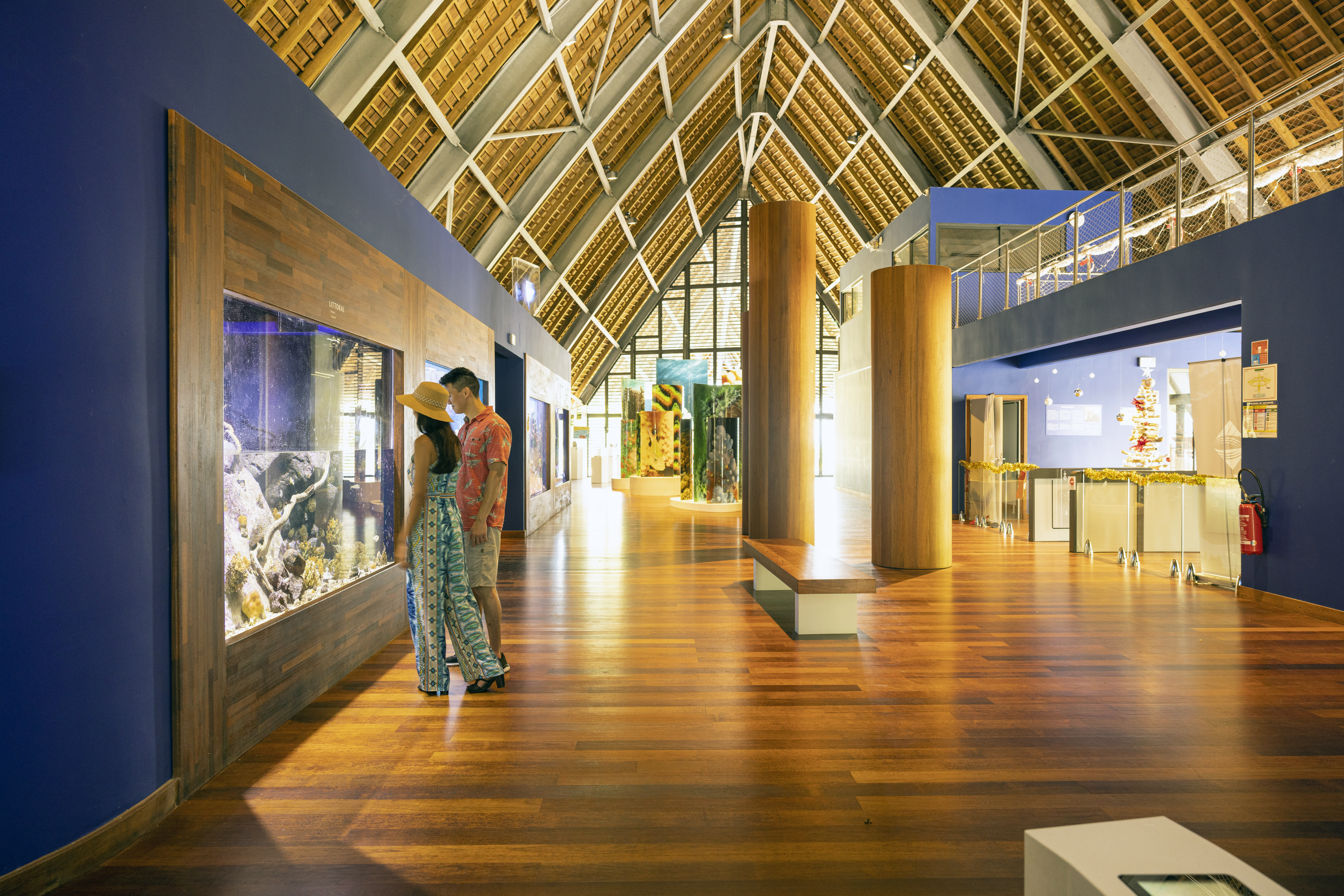 Couple Exploring Cultural Exhibits on a Tahiti Museum and Circle Island Tour